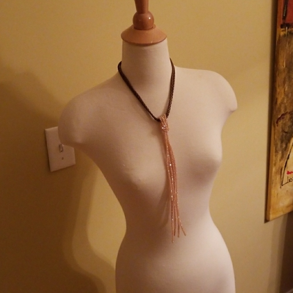Leather and headed necklace
